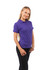 A woman wearing a purple women's 100% cotton pique knit polo shirt, paired with black trousers. The shirt features a collar and branding.