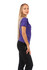 A purple women's polo shirt made from 100% cotton, worn by a model with long hair. The shirt has a branded logo.