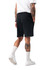 Men's cotton shorts in black, featuring a comfortable waistband and side pockets, displayed from a rear angle.