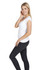A white women's Hanley T-shirt, featuring a fitted design, displayed on a model wearing black leggings.