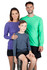 A green long sleeve t-shirt worn by a man, a purple long sleeve t-shirt worn by a woman, and a blue-grey long sleeve t-shirt worn by a boy.