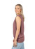 A woman models a stone-washed tank top in a soft mauve hue, featuring a relaxed fit and sleeveless design.