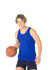 A man in a blue cotton singlet holds a basketball, smiling with short, curly hair, and wearing shorts.