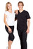 A woman in a white V-neck T-shirt and a man in a black V-neck T-shirt, both wearing casual black bottoms.
