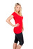 A woman wearing a red v-neck t-shirt paired with black shorts. The shirt has a fitted silhouette and a logo.
