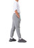 Grey cotton track pants with a three-layer design, featuring side pockets and cuffed ankles, worn with a white t-shirt.