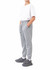 Grey three-layer cotton track pants with an elastic waistband, featuring side pockets and a casual fit.