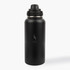 A drink bottle made of stainless steel, featuring a sleek black finish and a twist-on cap with a logo.