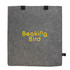 A grey felt tote bag with black handles and a logo prominently displayed in yellow and blue.