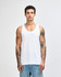 A unisex fine jersey tank in white, featuring a simple design and a logo on the garment.