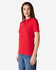 A red Gildan Softstyle Ladies' Double Pique Polo is displayed on a model, featuring a collar and short sleeves.