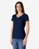 A navy Gildan Softstyle ladies' V-neck T-shirt displayed on a model, with a simple and minimalist design.