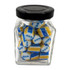A small glass jar filled with blue and yellow rock candy pieces, featuring a black lid and a logo on the jar.