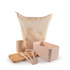 A mesh bag in cream holds a cream mug, wooden cutting board, pink lunch boxes, and pink cutlery.