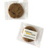 Mixed biscuits in a clear cello bag, featuring brown cookies. The packaging includes a logo and branding.