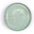 A round, translucent green flyer with a smooth surface and a subtle marbled effect. Features a logo on the bottom.