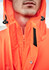 An orange waterproof jacket featuring a high visibility design and a zippered front. It includes a hood with adjustable toggles.