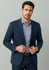 A navy men's blazer jacket worn over a light blue checkered shirt, featuring a subtle logo.