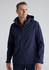 A navy rain jacket with a hood, featuring zippered pockets and a subtle logo.