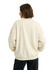 A cream oversized crew neck fleece jumper, featuring a relaxed fit and long sleeves, viewed from the back.