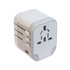 A travel adaptor featuring multiple plug configurations and a USB port, designed for international use.