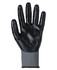 A grey and black nitrile gripper glove with a textured surface and a knitted wrist cuff. Features a logo.