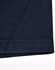 A close-up of a navy blue polo shirt featuring contrast stitching and a logo.