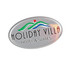 An oval sticker featuring colourful design elements and a logo, with the words "Holiday Villa Hotel & Suites" in bold.