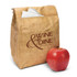 A brown paper lunch bag with a logo and an apple beside it. The bag includes folded napkins inside.