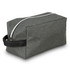 A toiletry bag in a textured gray fabric with a black leather handle and a white zipper.