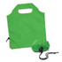 A green reusable grocery bag folded into a compact pouch, featuring a drawstring closure and a simple handle.