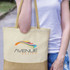 A cream tote bag with a contrasting brown bottom section, featuring a logo on the front.