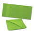 A vibrant green Dune Beach Towel lies flat, while a folded version of the same towel showcases its soft texture.