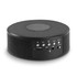 A round black wireless speaker with control buttons and a textured top. Includes a branding logo.