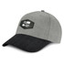 A grey cap with a black peak, featuring a patch with a logo on the front.