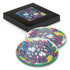 A round glass coaster set of two featuring vibrant colours and intricate floral designs, packaged in a black box.