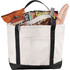 A heavy weight cotton boat tote in cream and black, filled with food items and a drink bottle. It features a logo.