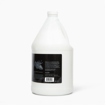 Amenie Sicilian Tangerine Conditioner gallon bottle with sleek black label on white background