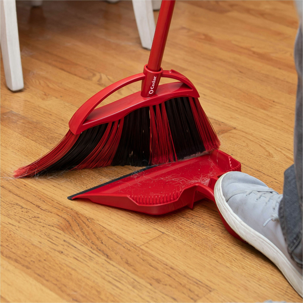 O-Cedar PowerCorner broom and Step-On Dust Pan collecting debris on hardwood floor