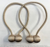 Beyond their practicality, these Beige Magnetic Tassels serve as exquisite embellishments for your window treatments.