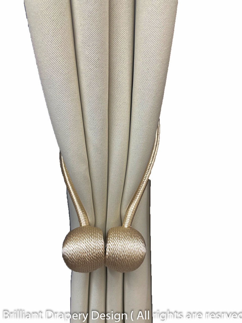 Beyond their practicality, these Beige Magnetic Tassels serve as exquisite embellishments for your window treatments.