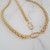 Matching gold necklace and bracelet set