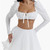 HOUSE OF CB SHIRA LONG SLEEVE WHITE CROP TOP! WHITE CROP TOP WITH AN OFF-THE SHOULDER STYLE, WIDE NECKLINE, & LONG SLIGHTLY PUFFY SLEEVES!