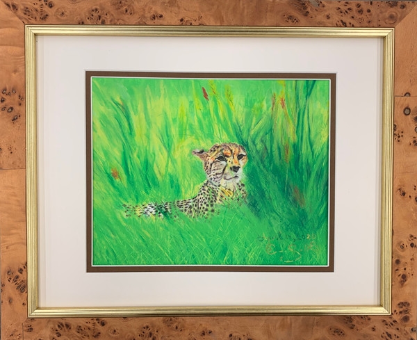 Pastel artwork of a cheetah resting in open grassland.