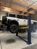 Nationwide NW10KFP-E Symmetric Floor Plate Two Post Car Lift 10,000 lbs