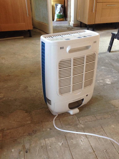 Dehumidifier permanent drain hose (not supplied)