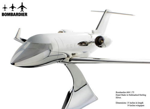 Bombardier 604 silver plane 15” long
