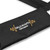 Close-up of World Rhythm embroidered logo and padded lower back support section on a durable nylon djembe drum harness designed for percussion players.