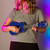 Lifestyle image of the Mad About Blue soprano ukulele being played. Lightweight beginner ukulele with carbon strings, geared tuning pegs and a compact 21-inch design, ideal for children, students and first-time players.