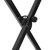 Close-up of Tiger X-frame keyboard stand height adjustment joint, black metal cross brace with tightening knob and circular locking plate.